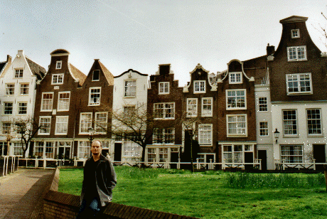 Andrew in the Begijnhof - note the different gables on the houses behind, Amsterdam, The Netherlands